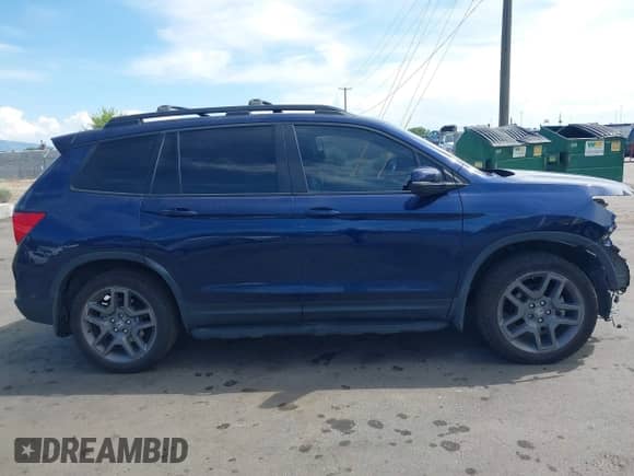 2023 Honda Passport EX-L with VIN 5FNYF8H50PB007445, listed as a IAAI auction lot 42462561 with 33,540 mi miles and . Bid and sale history available at DreamBid. Image 14.
