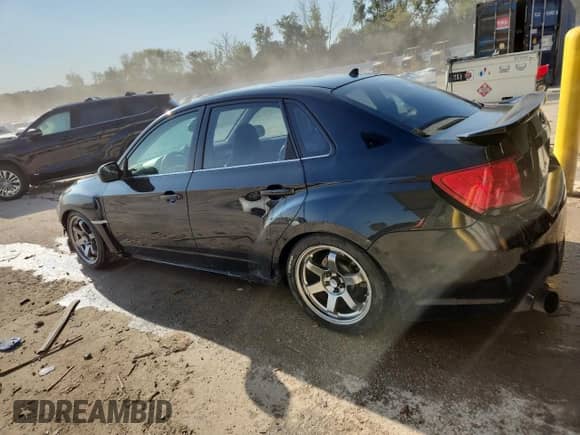 2012 Subaru WRX WRX Premium with VIN JF1GV7F60CG018066, listed as a Copart auction lot 70885795 with 143,615 mi miles and Clean title. Bid and sale history available at DreamBid. Image 2.