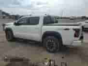 2023 Nissan Frontier Pro-4X with VIN 1N6ED1EK4PN630074, listed as a Copart auction lot 81289625 with 48,204 mi miles and Salvage title. Bid and sale history available at DreamBid. Image 2.