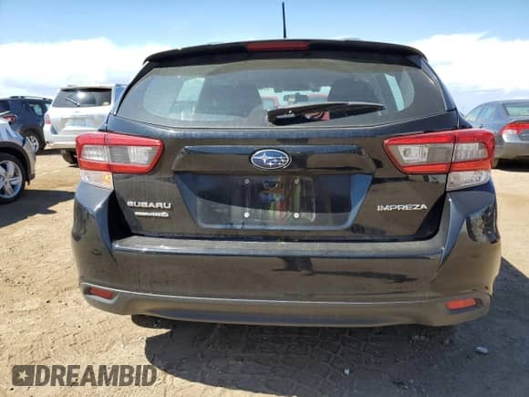 2021 Subaru Impreza with VIN 4S3GTAB65M3712196, listed as a Copart auction lot 70655975 with 23,410 mi miles and Salvage title. Bid and sale history available at DreamBid. Image 6.