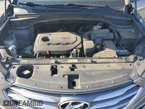 2017 Hyundai Santa Fe 2.4L z VIN 5XYZTDLB1HG442312, wystawiony jako Copart lot #80399965 z przebiegiem 176 503 mil mil oraz Szkoda całkowita • Salvage title. Historia ofert i sprzedaży dostępna na DreamBid. Obrazek 12.
