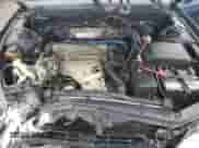 1995 Toyota Camry DX z VIN 4T1SK11EXSU477240, wystawiony jako Copart lot #68422685 z przebiegiem 146 403 mil mil oraz Szkoda całkowita • Salvage title. Historia ofert i sprzedaży dostępna na DreamBid. Obrazek 11.