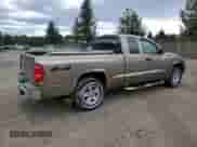 2006 Dodge Dakota SLT with VIN 1D7HW42K96S572291, listed as a Copart auction lot 64859254 with 147,527 mi miles and Clean title. Bid and sale history available at DreamBid. Image 3.