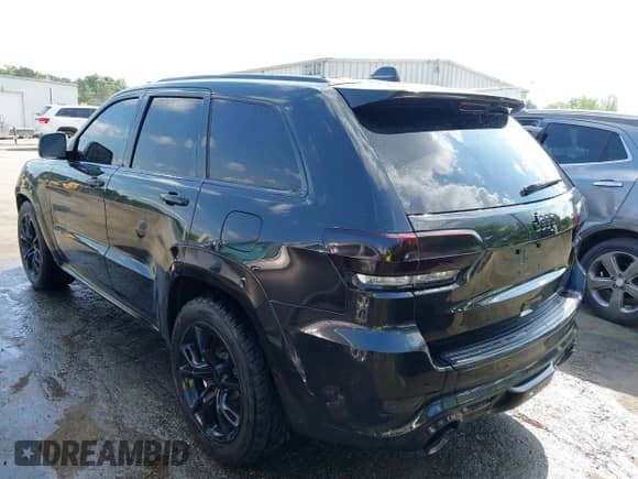 2014 Jeep Grand Cherokee SRT-8 z VIN 1C4RJFDJ2EC174412, wystawiony jako IAAI lot #42116541 z przebiegiem 124 693 mil mil oraz . Historia ofert i sprzedaży dostępna na DreamBid. Obrazek 3.