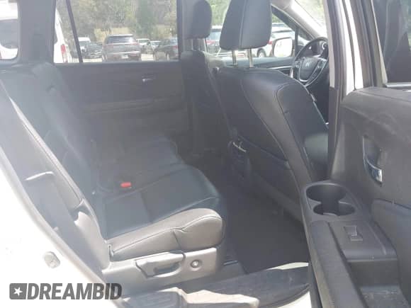 2017 Honda Pilot EX-L with VIN 5FNYF6H77HB017722, listed as a IAAI auction lot 42800151 with 94,457 mi miles and . Bid and sale history available at DreamBid. Image 8.