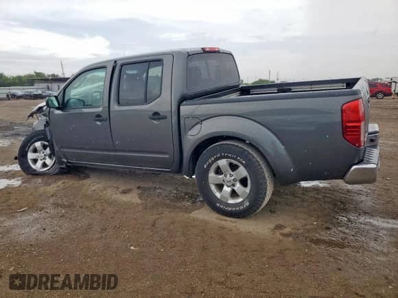 2009 Nissan Frontier SE with VIN 1N6AD07U89C423645, listed as a Copart auction lot 62332865 with 48,210 mi miles and Salvage title. Bid and sale history available at DreamBid. Image 2.