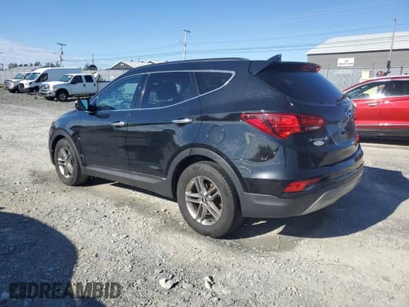 2017 Hyundai Santa Fe 2.4L z VIN 5XYZUDLB7HG475943, wystawiony jako Copart lot #83788275 z przebiegiem 117 858 mil mil oraz Szkoda całkowita • Salvage title. Historia ofert i sprzedaży dostępna na DreamBid. Obrazek 2.