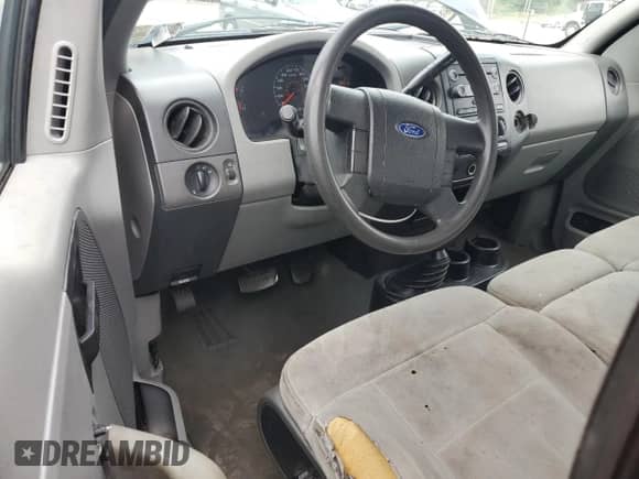 2007 Ford F-150 XL with VIN 1FTRF14W87KD63476, listed as a Copart auction lot 67541145 with 238,664 mi miles and Salvage title. Bid and sale history available at DreamBid. Image 8.