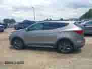 2018 Hyundai Santa Fe Ultimate with VIN 5NMZW4LAXJH069328, listed as a IAAI auction lot 42487378 with 51,859 mi miles and . Bid and sale history available at DreamBid. Image 14.