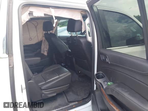 2017 Chevrolet Suburban Premier z VIN 1GNSCJKCXHR204770, wystawiony jako IAAI lot #42262898 z przebiegiem 166 304 mil mil oraz . Historia ofert i sprzedaży dostępna na DreamBid. Obrazek 8.