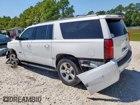 2017 Chevrolet Suburban LT с VIN 1GNSCHKC1HR375772, выставлен на аукционе Copart как лот 71310465 с пробегом 175 805 миль миль и Списание • Salvage title. История ставок и продаж доступна на DreamBid. Изображение 2.
