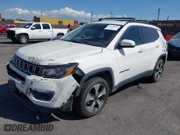 2017 Jeep Compass Latitude z VIN 3C4NJDBB8HT666563, wystawiony jako IAAI lot #43228511 z przebiegiem 116 669 mil mil oraz . Historia ofert i sprzedaży dostępna na DreamBid. Obrazek 2.