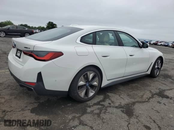 2024 BMW i4 xDrive40 с VIN WBY83FB04RFT01096, выставлен на аукционе Copart как лот 61055045 с пробегом 1 370 миль миль и Списание • Salvage title. История ставок и продаж доступна на DreamBid. Изображение 3.
