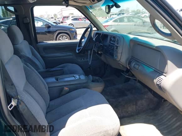 1999 Chevrolet Tahoe z VIN 1GNEC13R9XJ503955, wystawiony jako IAAI lot #42830511 z przebiegiem 185 483 mil mil oraz . Historia ofert i sprzedaży dostępna na DreamBid. Obrazek 5.