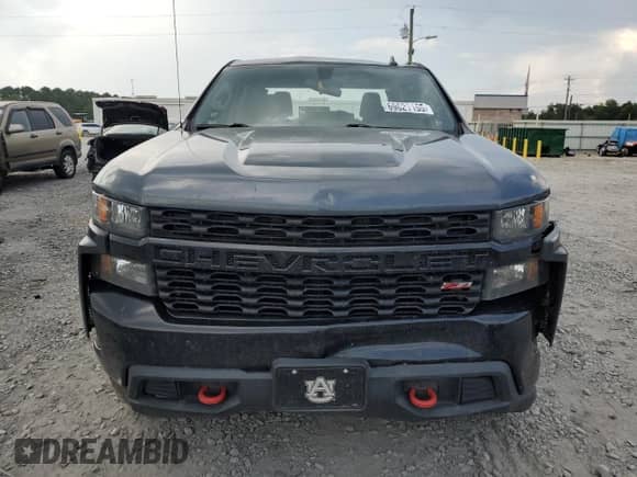 2021 Chevrolet Silverado 1500 Custom Trail Boss with VIN 1GCPYCEF0MZ283586, listed as a Copart auction lot 69621155 with 97,773 mi miles and Salvage title. Bid and sale history available at DreamBid. Image 5.