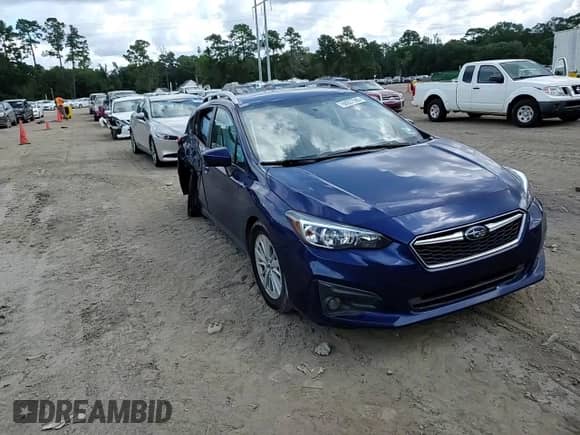 2018 Subaru Impreza Premium with VIN 4S3GTAD62J3714075, listed as a Copart auction lot 68227595 with 148,222 mi miles and Salvage title. Bid and sale history available at DreamBid. Image 13.