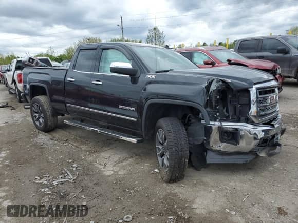 2014 GMC Sierra 1500 SLT with VIN 1GTV2VECXEZ263938, listed as a Copart auction lot 55219265 with Not provided miles and Salvage title. Bid and sale history available at DreamBid. Image 4.