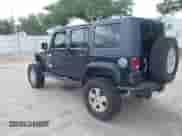 2007 Jeep Wrangler Unlimited Sahara z VIN 1J8GA59187L104774, wystawiony jako IAAI lot #42485359 z przebiegiem 192 254 mil mil oraz . Historia ofert i sprzedaży dostępna na DreamBid. Obrazek 3.