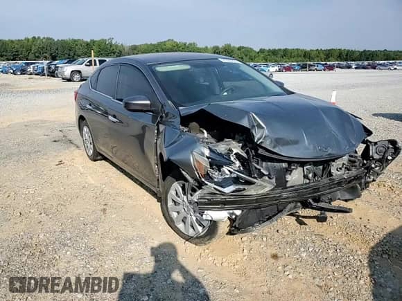 2019 Nissan Sentra S z VIN 3N1AB7AP4KY251957, wystawiony jako Copart lot #81235295 z przebiegiem 59 397 mil mil oraz Szkoda całkowita • Salvage title. Historia ofert i sprzedaży dostępna na DreamBid. Obrazek 13.