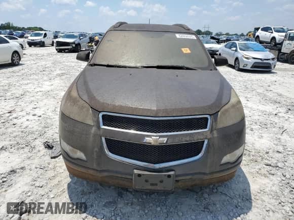 2009 Chevrolet Traverse LS z VIN 1GNEV13D69S162574, wystawiony jako Copart lot #62052225 z przebiegiem 175 811 mil mil oraz Czysty tytuł • Clean title. Historia ofert i sprzedaży dostępna na DreamBid. Obrazek 5.