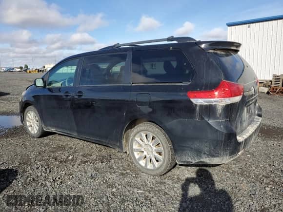 2013 Toyota Sienna LE with VIN 5TDJK3DC8DS053519, listed as a Copart auction lot 86544555 with 214,498 mi miles and Salvage title. Bid and sale history available at DreamBid. Image 2.