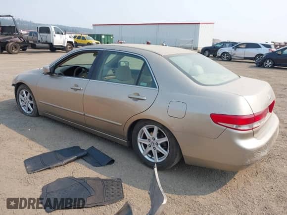 2004 Honda Accord EX with VIN JHMCM56614C031240, listed as a IAAI auction lot 43145132 with 135,971 mi miles and . Bid and sale history available at DreamBid. Image 3.