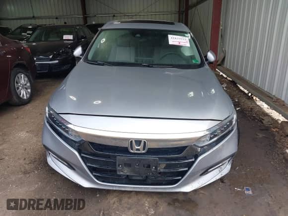 2018 Honda Accord EX z VIN 1HGCV3F43JA017236, wystawiony jako IAAI lot #41835933 z przebiegiem 106 mil mil oraz . Historia ofert i sprzedaży dostępna na DreamBid. Obrazek 11.