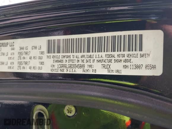2013 Ram 1500 SLT z VIN 1C6RR6LG8DS545809, wystawiony jako IAAI lot #42013194 z przebiegiem 154 603 mil mil oraz . Historia ofert i sprzedaży dostępna na DreamBid. Obrazek 9.