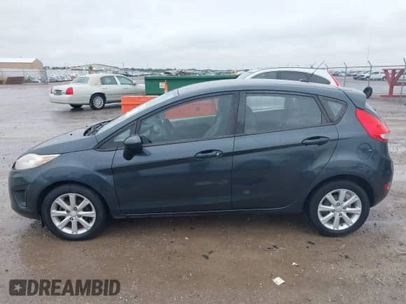2011 Ford Fiesta SE with VIN 3FADP4EJ9BM156808, listed as a IAAI auction lot 43412420 with 78,092 mi miles and . Bid and sale history available at DreamBid. Image 14.