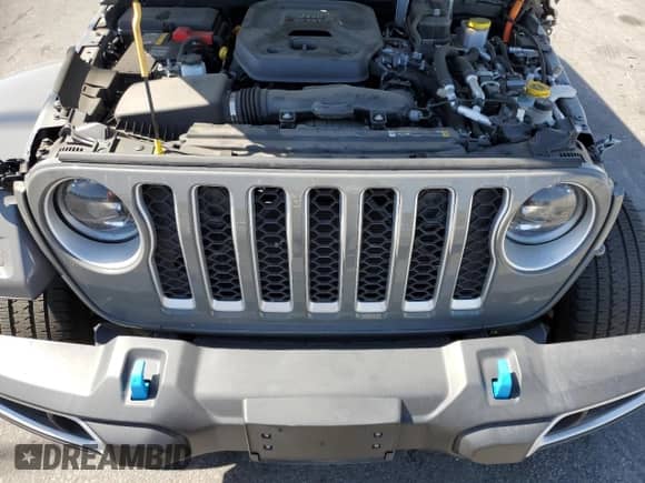 2023 Jeep Wrangler Sahara with VIN 1C4JJXP62PW580914, listed as a Copart auction lot 85308355 with 14,223 mi miles and Salvage title. Bid and sale history available at DreamBid. Image 12.
