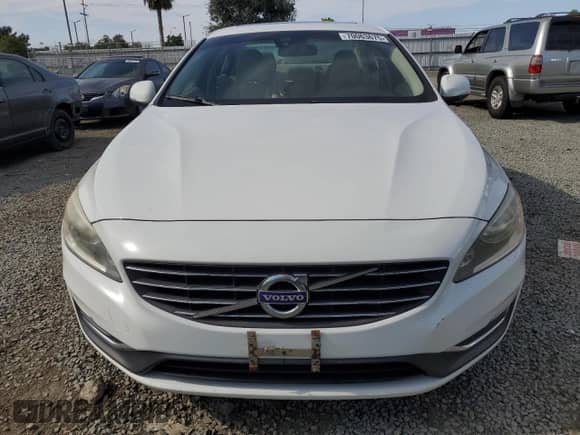 2014 Volvo S60 T5 z VIN YV1612FH7E2275192, wystawiony jako Copart lot #70063675 z przebiegiem 127 396 mil mil oraz Czysty tytuł • Clean title. Historia ofert i sprzedaży dostępna na DreamBid. Obrazek 5.