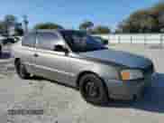 2002 Hyundai Accent GS z VIN KMHCG35C72U192411, wystawiony jako Copart lot #85322524 z przebiegiem 130 977 mil mil oraz Szkoda całkowita • Salvage title. Historia ofert i sprzedaży dostępna na DreamBid. Obrazek 4.