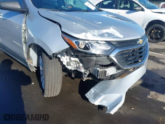 2021 Chevrolet Equinox LS z VIN 3GNAXHEV5MS125648, wystawiony jako IAAI lot #43360418 z przebiegiem 56 845 mil mil oraz . Historia ofert i sprzedaży dostępna na DreamBid. Obrazek 6.
