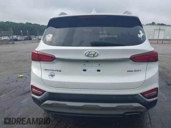 2020 Hyundai Santa Fe SEL with VIN 5NMS3CAA4LH176420, listed as a IAAI auction lot 42472600 with 59,221 mi miles and . Bid and sale history available at DreamBid. Image 16.