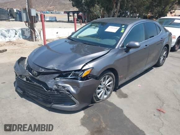 2023 Toyota Camry LE z VIN 4T1C11AK8PU106694, wystawiony jako IAAI lot #42902448 z przebiegiem 100 034 mil mil oraz . Historia ofert i sprzedaży dostępna na DreamBid. Obrazek 17.