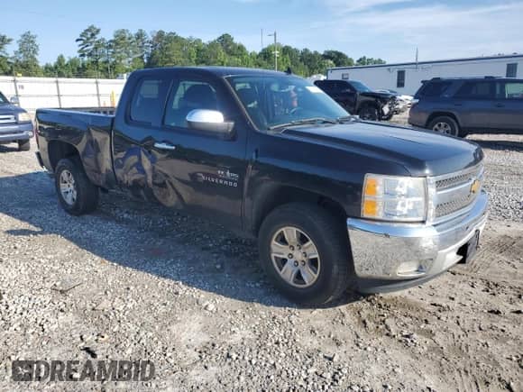 2013 Chevrolet Silverado 1500 LT with VIN 1GCRCSE05DZ290868, listed as a Copart auction lot 61392055 with 141,889 mi miles and Salvage title. Bid and sale history available at DreamBid. Image 4.