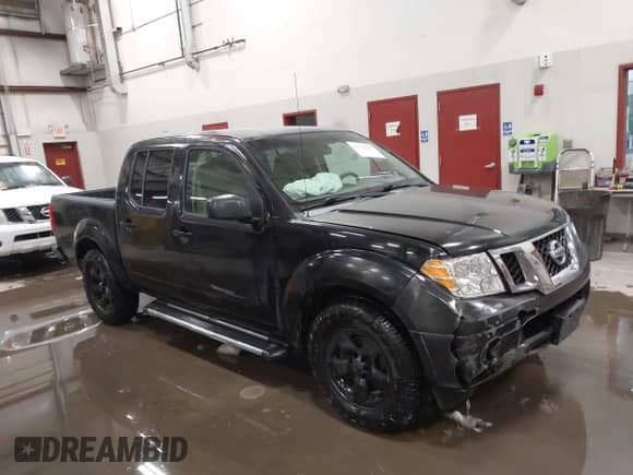 2009 Nissan Frontier SE with VIN 1N6AD07U59C401327, listed as a IAAI auction lot 41591067 with 203,043 mi miles and . Bid and sale history available at DreamBid. Image 1.