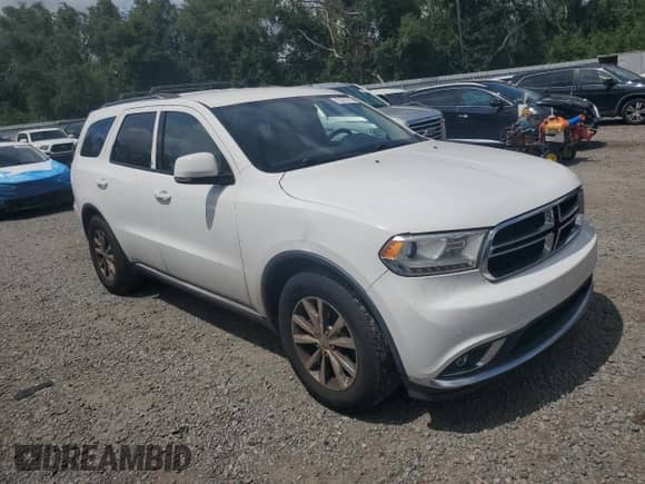 2015 Dodge Durango Limited with VIN 1C4RDHDG3FC800834, listed as a Copart auction lot 72073115 with 196,196 mi miles and Salvage title. Bid and sale history available at DreamBid. Image 4.