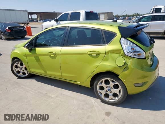 2012 Ford Fiesta SES with VIN 3FADP4FJ3CM111721, listed as a Copart auction lot 80182725 with 119,654 mi miles and Salvage title. Bid and sale history available at DreamBid. Image 2.