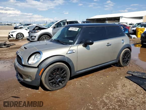 2010 MINI Hardtop S with VIN WMWMF7C58ATZ70756, listed as a Copart auction lot 81047265 with 95,643 mi miles and Salvage title. Bid and sale history available at DreamBid. Image 1.