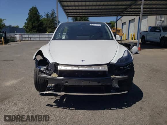 2023 Tesla Model Y Long Range с VIN 7SAYGDEE0PF637947, выставлен на аукционе Copart как лот 61927575 с пробегом 57 538 миль миль и Списание • Salvage title. История ставок и продаж доступна на DreamBid. Изображение 5.