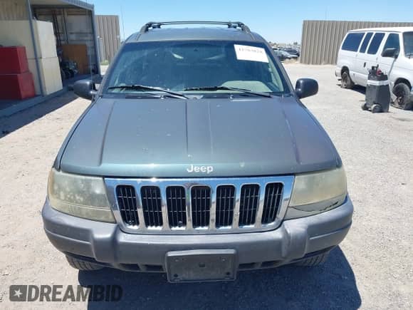 2003 Jeep Grand Cherokee Laredo z VIN 1J4GX48S03C609724, wystawiony jako IAAI lot #42783828 z przebiegiem 226 965 mil mil oraz . Historia ofert i sprzedaży dostępna na DreamBid. Obrazek 12.