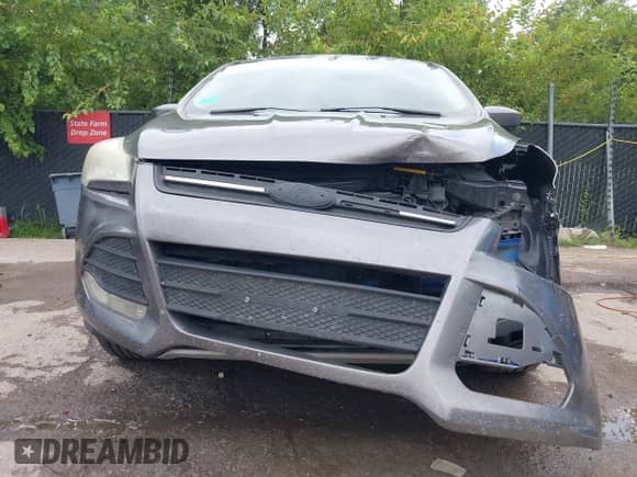 2014 Ford Escape SE z VIN 1FMCU0GX4EUD79133, wystawiony jako IAAI lot #42881509 z przebiegiem 158 715 mil mil oraz . Historia ofert i sprzedaży dostępna na DreamBid. Obrazek 6.