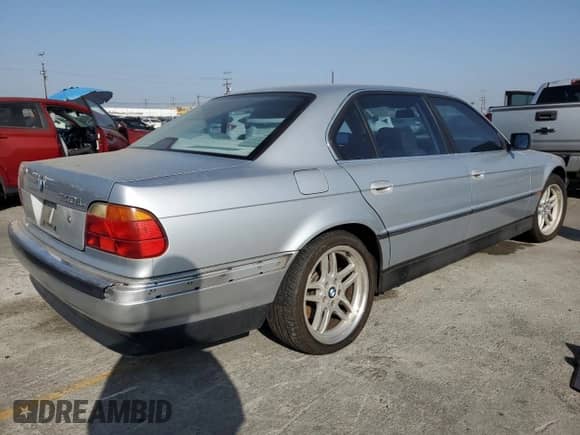 1997 BMW 7 Series 740iL with VIN WBAGJ8328VDM00702, listed as a Copart auction lot 63689375 with 210,180 mi miles and Clean title. Bid and sale history available at DreamBid. Image 3.
