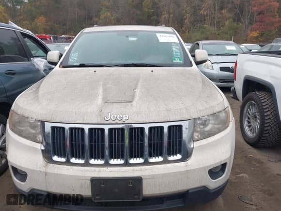 2012 Jeep Grand Cherokee Laredo z VIN 1C4RJFAG2CC248790, wystawiony jako IAAI lot #43563104 z przebiegiem 162 187 mil mil oraz . Historia ofert i sprzedaży dostępna na DreamBid. Obrazek 6.