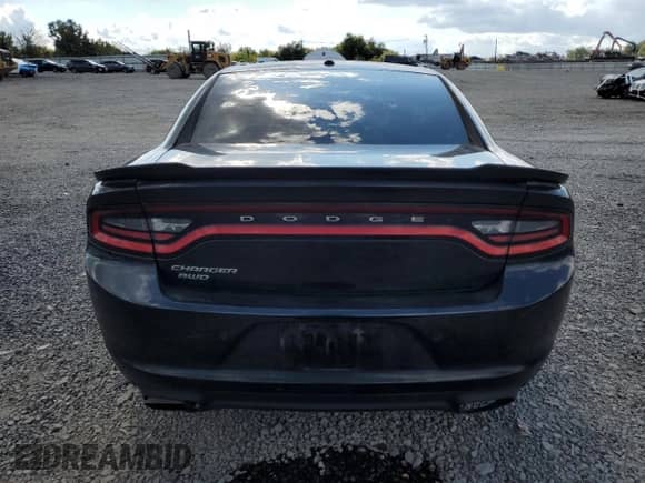 2015 Dodge Charger SE with VIN 2C3CDXFG1FH762857, listed as a Copart auction lot 70939295 with 170,821 mi miles and Salvage title. Bid and sale history available at DreamBid. Image 6.