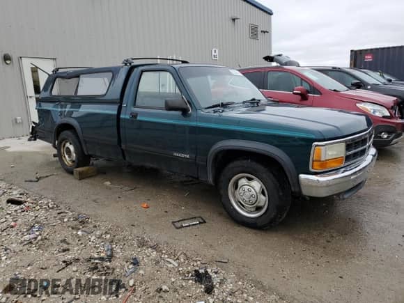 1993 Dodge Dakota S с VIN 1B7FL26X1PS258088, выставлен на аукционе Copart как лот 53906475 с пробегом 134 453 миль миль и На запчасти • Non repairable. История ставок и продаж доступна на DreamBid. Изображение 4.
