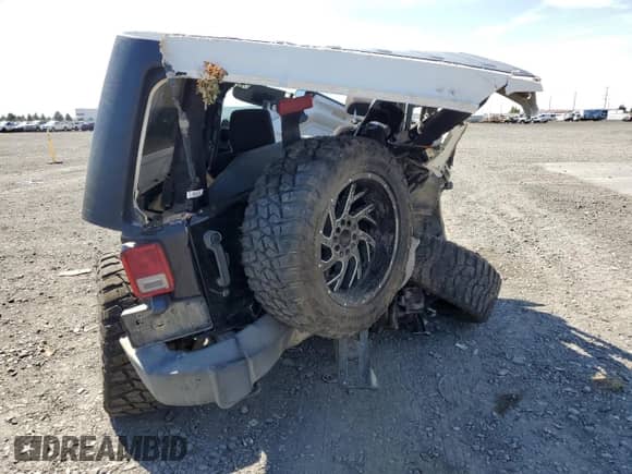 2013 Jeep Wrangler Sport with VIN 1C4AJWAG2DL547243, listed as a Copart auction lot 69401525 with Not provided miles and Salvage title. Bid and sale history available at DreamBid. Image 6.