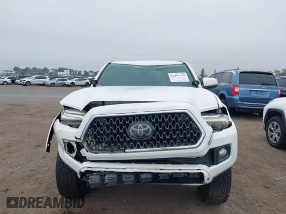 2018 Toyota Tacoma SR5 с VIN 3TMAZ5CN3JM054602, выставлен на аукционе IAAI как лот 42454756 с пробегом 123 009 миль миль и . История ставок и продаж доступна на DreamBid. Изображение 12.