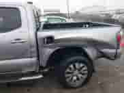 2021 Toyota Tacoma Limited with VIN 3TMGZ5ANXMM421920, listed as a IAAI auction lot 40852472 with 28,591 mi miles and . Bid and sale history available at DreamBid. Image 6.